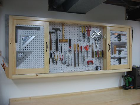 Workshop Cabinets Woodshop | Creekside Woodshop-New Projects Sliding Pegboard, Pegboard Tool Storage, Giant Pegboard, Tool Storage Ideas, Storage For Tools, Wall Sheets, Workshop Cabinets, Diy Locker, Cabinet Woodworking Plans