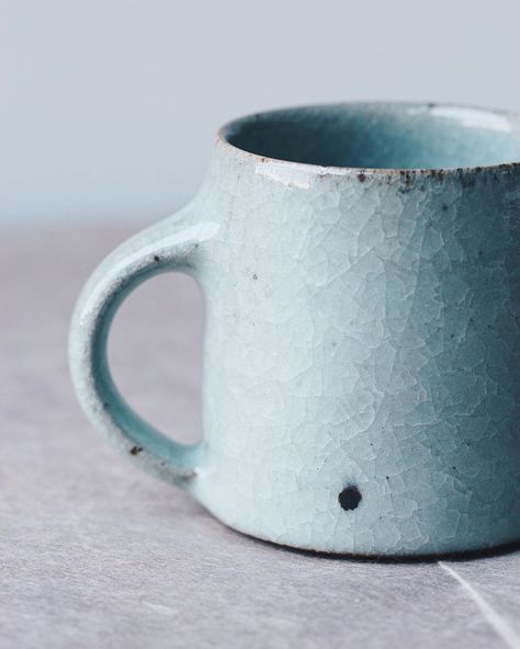 Florian Gadsby on Instagram: “A side view of a pale blue stoneware mug with a large iron blossom that was drawn out through the reduction firing. I wish these dots…” Reduction Fired Pottery, Ceramics Dishes, Florian Gadsby, Crafts Table, Table Wear, Table Ware, Craft Table, Ceramic Dishes, Stoneware Mugs