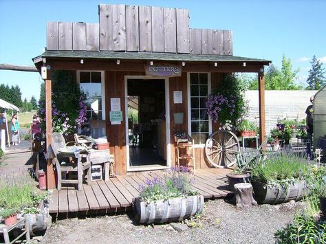 looks like an old country store front; love the lavender beds in front <3 Western Store Front Ideas, Things Made Out Of Wood, Old Store Fronts, Western Backyard, Lavender Beds, Christmas Wood Craft, Old General Stores, Old West Saloon, Rustic Shed