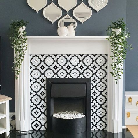 Savvy DIY-er transforms fireplace surround with self adhesive floor tiles Fireplace Moroccan Tile, Aesthetic Fireplace, Fireplace Christmas Decorations, Fireplace Aesthetic, Painted Fireplace Mantels, Tile Around Fireplace, Self Adhesive Floor Tiles, Adhesive Floor Tiles, Fireplace Christmas