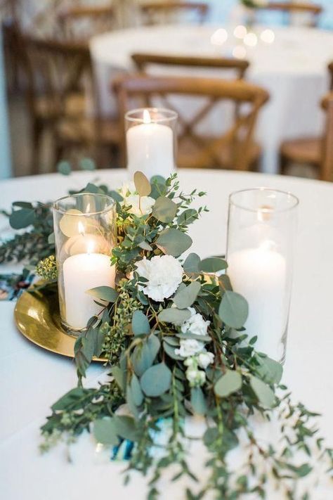 candle wedding centerpiece ideas Wedding Tables With Eucalyptus, Wedding Eucalyptus Centerpieces, Eucalyptus And Rose Centerpiece, Wedding Table Candle Decorations, Wedding Table Set Up Ideas, Eucalyptus Centerpiece Wedding, Centerpieces With Eucalyptus, Wedding Eucalyptus Decor, Eucalyptus Table Setting