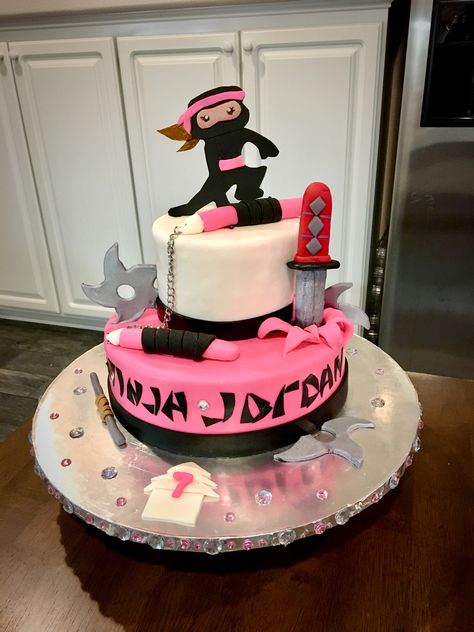 Pink girl ninja cake. #elleiciawalters #bakenbits Spy Ninja Cake, Ninja Kidz Cakes, Ninja Cake Ideas, Clementine Birthday, Ninja Cakes, Ninja Birthday Cake, Ninja Themed Birthday Party, Karate Cake, Karate Birthday Party