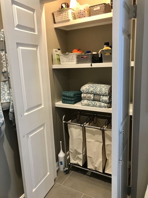 Bathroom linen closet with laundry basket. So much storage. Closet With Laundry Basket, Closet In Bathroom, Closet With Laundry, End Of Hallway, Bathroom Linen Closet, Linen Cupboard, Dream Bath, Bathroom Closet, Frameless Shower Doors