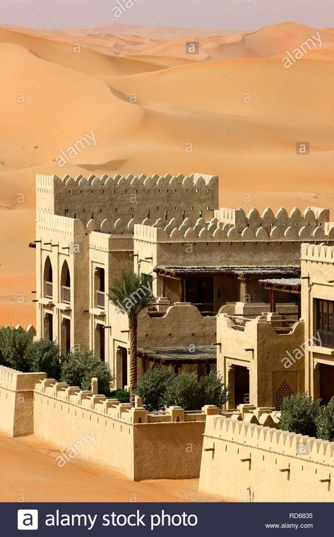 Desert luxury hotel Anantara Qasr Al Sarab, hotel resort built like a desert fort, surrounded by high sand dunes, near the Liwa Stock Photo Oman Hotels, Desert Luxury, Desert Resort, Sheikh Zayed Grand Mosque, Boundary Walls, Desert Fashion, Hotel Reception, Desert Oasis, Hotel Resort