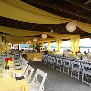 It's amazing what a little fabric can do: Use a bright color, like yellow, if you're after a fun vibe, or keep it formal and elegant with white or champagne fabric. Bonus: Take this route and you can go light on the table decor and still get the same decked-out reception look. Public Park Wedding, Pavilion Decor, Park Gazebo, Pavillion Wedding, Picnic Shelter, Park Pavilion, Wedding Reception Planning, Fabric Draping, Pavilion Wedding