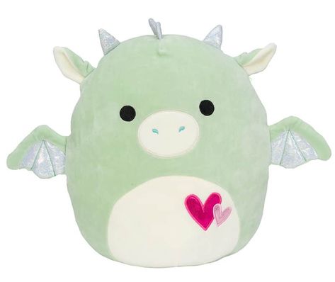 Desmund the Dragon is a green Squishmallow from the Valentine Squad. When it comes to cooking, look no further than Desmund! Not only does Desmund cook with the best spices and flavors, but he also heats up his steak with his burning hot breath. Everyone in his squad loves a special, home-cooked meal made by Desmund! Desmund is an sage green dragon with a white snout and belly. His inner ears, wing membranes, horns and the spikes on his back are all shimmering silver. He has two large black eyes Squishmallow Backpack, Goose Gifts, Elephant Stuffed Animal, Pillow Pals, Drawing Bag, Animal Bag, Green Toys, Plush Backpack, Green Dragon