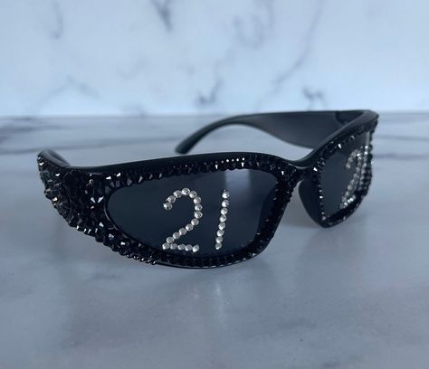 21st Birthday Sunglasses with Crystal Frames and Text in Crystals on the lens. Or, Personalize with Any Number or Date or a short Word or Name.  Perfect for Weddings, Bachelor, Bachelorette, Bride, Jersey Number, Sports Fan, Celebration, Party Glasses. Check out easily with the color and 21 design or use the Custom variation and add your design request to the Personalize section. Custom made to order. Finished quickly and free US shipping. Unique one of a kind birthday present and affordable sty Bride Jersey, Festa All Black, 21st Birthday Themes, Birthday Sunglasses, 21 Party, 21st Bday Ideas, 21st Birthday Photoshoot, 21st Birthday Decorations, 21st Party