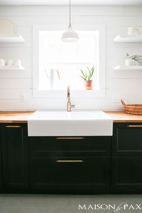 Love modern farmhouse style? This DIY modern farmhouse kitchen will blow you away: shiplap, open shelving, color blocking, butcher block counters... all affordable and super stylish! Modern Minimal Kitchen, Rustic Kitchen Sinks, Kitchen Sink Decor, Modern Farmhouse Diy, Kitchen Sink Design, Butcher Blocks, Modern Farmhouse Kitchen, Minimal Kitchen, Cabinets Ideas