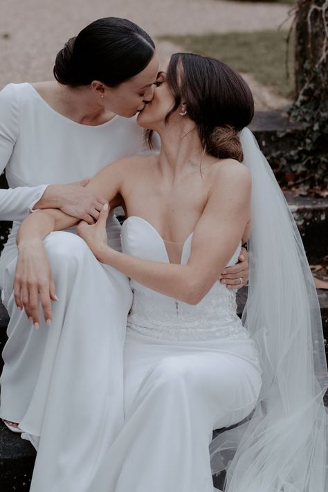 Two brides kissing | image by Emily Robinson Photography Emily Robinson, Wild Floral Arrangements, Park Wedding Ceremony, Tender Kiss, Lesbian Weddings, Woman Loving Woman, Unconventional Wedding, Dresses Satin, Two Brides