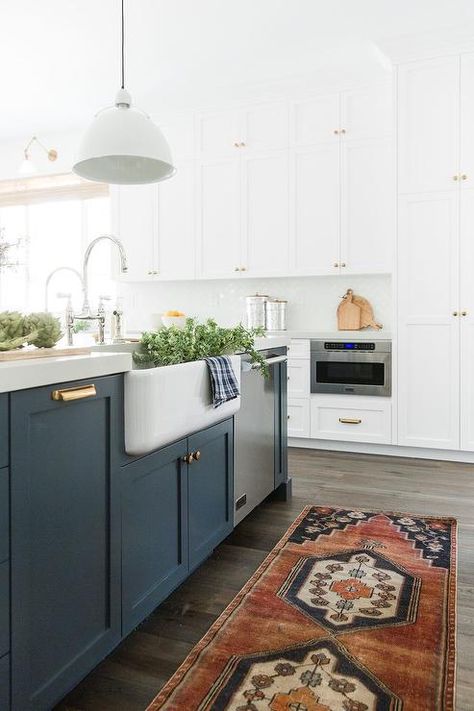 Navy blue island features vintage aged brass pulls in a transitional kitchen accented with a navy blue and red vintage runner on gray wash oak wood floors. Navy Kitchen Cabinets, Studio Mcgee Kitchen, Countertop Concrete, Navy Blue Kitchen Cabinets, Interior Ikea, Blue Kitchen Island, Two Tone Kitchen Cabinets, Ikea Interior, Farmhouse Kitchen Remodel