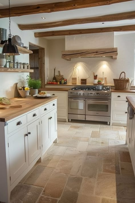 Enhance the aesthetic appeal and functionality of your farmhouse kitchen with these 54 flooring ideas. Explore a diverse range of materials, finishes, and patterns that bring beauty and durability to your culinary space. #FarmhouseKitchen #AestheticAppeal #FunctionalFlooring Kitchen Floor Not Wood, Tiled Kitchen Floor Ideas, Country Style Flooring, Kitchen Stone Tile Floor, Stone Floor In Kitchen, French Country Kitchen Flooring Ideas, Cottage Stone Floor, Cottage Kitchen Flooring Ideas, French Country Kitchen Flooring