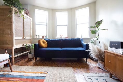 Anthropologie Bedroom Bedding, Blue Suede Couch, West Elm Dining Chairs, West Elm Dining Room, Urban Outfitters Bathroom, Anthropologie Bedroom, Blue Striped Curtains, Suede Couch, Unusual Objects