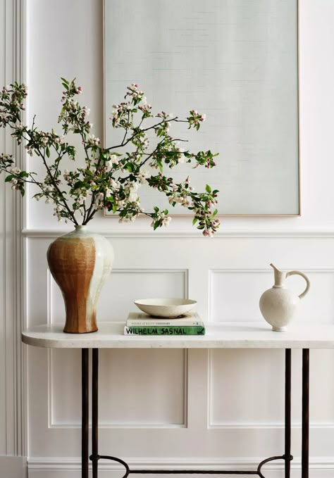 Even if you have a small entryway or apartment entryway, it doesn't mean there is no room to be decorative. Long and narrow spaces call for a console table to really ramp up the luxury look. Place your console table flush against the wall and use the surface area to create a curated decorative moment to welcome guests into the space while establishing the style of your interiors. (Image credit: Read McKendree. Design: Chango & Co) Old Greenwich, Narrow Entryway, Apartment Entryway, Console Table Decorating, Mini Table Lamps, Custom Furniture Design, Entry Way Design, Small Entryway, Small Hallways