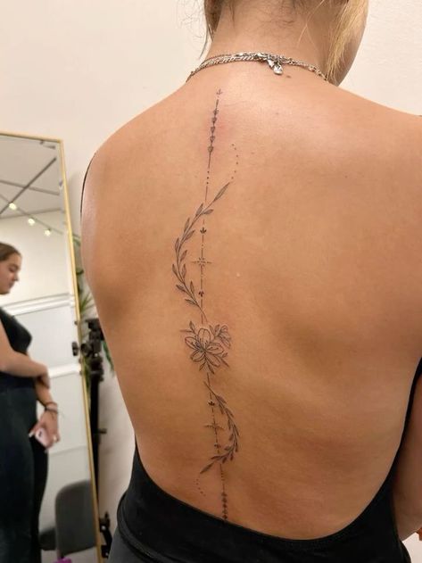 Back Tattoo Inspo Aesthetic, Indian Back Tattoo For Women, Ribs Women Tattoo, Vines Down Spine Tattoo, Back Tattooed Woman, Feminine Dragon Spine Tattoo, Body Botanical Tattoo, May Birth Flower Spine Tattoo, Spin Tatoos Ideas