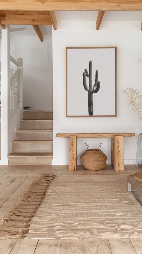 Bring the serene beauty of the desert into your home with this minimalist black and white cactus print. This striking photograph captures the elegant form of a tall cactus set against a clean white background, making it a perfect addition to any modern or minimalist decor. Ideal for living rooms, bedrooms, or office spaces, this art piece adds a touch of nature and tranquility to your space. Available in various sizes, this print is ready to frame and display. Elevate your home decor with this t Desert Prints Wall Art, Modern Southwest Entryway, Modern Western Entryway, Desert Coastal Decor, Desert House Interior Design, Modern Desert Interior, Desert Vibes Decor, Desert House Decor, Scandinavian Western Interior