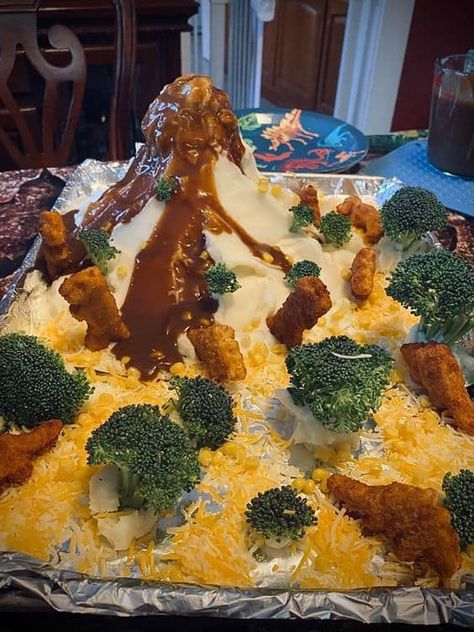 30 Dinosaur Birthday Party Ideas - Lady Celebrations Dinosaur Mashed Potatoes, Dino Dinner Ideas, Dino Nuggets Volcano, Dinosaur Volcano Mashed Potatoes, Fun Birthday Dinner Ideas For Kids, Volcano Mashed Potatoes, Dinosaur Mashed Potato Volcano, Dino Nuggets And Mashed Potatoes, Dino Nugget Volcano