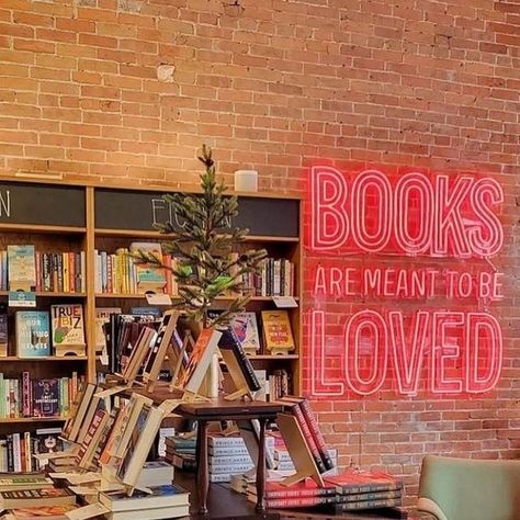 Britnae Purdy on Instagram: "Posted @withregram • @americanbooksellers Books are meant to be loved. ❤️🐶 Happy Valentine's Day! Today we're spotlighting @dogearedbooksames, an indie bookstore in Ames, Iowa—complete with shop pup, Lovie! Here's to a day sharing the love of books. 📍 @dogearedbooksames 📸 @dogearedbooksames #valentinesday #love #booklover #booklove #bookworm #worldbookshops #bookstore #bookshop #bookstagram #igreads #indiebookstore #indiebookshop #shelfie #neon #shopsmall #shoploc Cozy Bookshop Cafe, Book Store Displays Visual Merchandising, Own A Bookstore, Bright Bookstore, Book Store Ideas Design, Small Town Bookstore Aesthetic, Book Business Ideas, Romance Book Store, Indie Bookstore Aesthetic