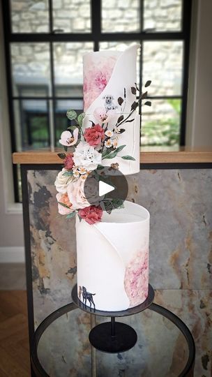 147K views · 27K reactions | CAN YOU SPOT ALL 4?... 

There is a misconception that if you add animals to a wedding cake, it turns it into a novelty cake, but I beg to differ on that one. 

I have painted endless animals onto sleek modern wedding cakes, and every time I love it. It brings such a personal touch to a cake whilst allowing the couples precious fur babies to be part of the day. 

I spend a lot of time designing the cake to capture the animals' characters and discretely incorporate them in the cake design. 

Today's cake for L & A at @thepeartreepurton captured all 4 if their precious pups, can you spot them all? 

Spacer @prop.options
Sugarpaste @couturesugarpaste
Flowerpots @suzanneespercakeschool

#cakeinspo #fondantcakes #sugarplowers #dogcake #weddingcakescotswolds #modernw Wedding Cake With Hidden Back, Cake Top Forward Design, Cake With Acrylic Spacer, Acrylic Spacer Cake Design, Wedding Cake Acrylic Spacer, Italian Desserts Traditional, Dog Cake, Modern Wedding Cake, Time Design