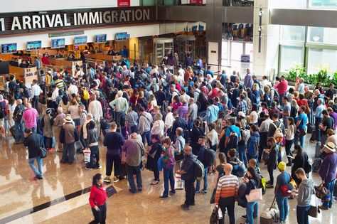 Queue at airport immigration. SINGAPORE - JAN 13, 2017: People waiting in queue #Sponsored , #affiliate, #PAID, #immigration, #Queue, #JAN, #SINGAPORE Airport Immigration, Airport Hacks, Global Entry, Film Netflix, Long Haul Flight, Checked Luggage, Emergency Plan, Online Checks, American Airlines