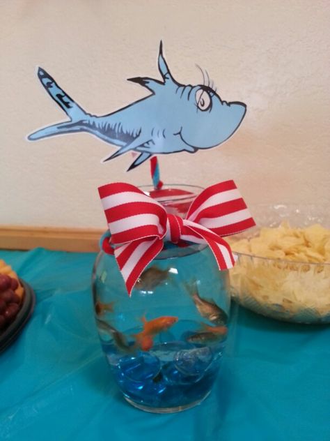 Dr suess fish bowl centerpieces Fish Bowl Centerpieces, Baby Boy Shower Themes, Bowl Centerpieces, Doctor Suess Birthday, Dr Seuss Party Ideas, Boy Shower Themes, Cat In The Hat Party, Dr Seuss Birthday Party, Dr. Seuss