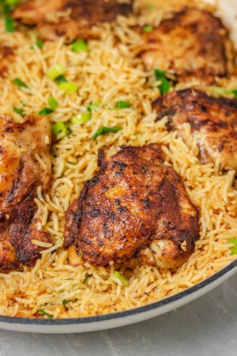 One Pot Chicken and Rice - The Dinner Bite Chicken Thigh And Rice Recipe, Dinner Staples, One Pot Rice Meals, One Pot Chicken And Rice, Chicken Thighs Dinner, Cob Loaf, Rice Meals, Basmati Rice Recipes, Easy Skillet Chicken