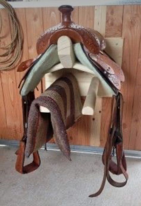 Wall Mounted Saddle Rack, Saddle Racks Ideas, Tack Room Makeover, Western Saddle Pad Storage Ideas, Tack Room Saddle Rack, Western Saddle Pad Storage, Saddle Storage Ideas, Western Tack Room Organization, Western Saddle Rack