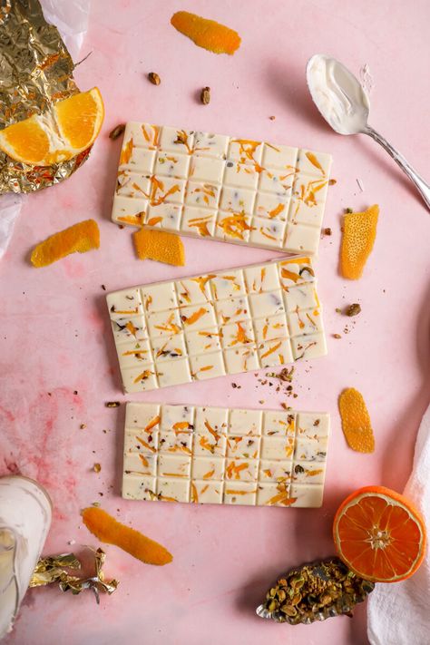 These white orange chocolate bars with pistachios are just what you need if you have extra orange peels. They’re easy to make, and the best part is that they’re gluten-free! I love how this recipe… The post How to Make Homemade Orange White Chocolate Bars appeared first on The Glutenless Maximus. Seashell Chocolates, Charcuterie Business, White Chocolate Bars, White Chocolate Syrup, Chocolate Bar Recipe, Halloween Candies, Dreamy Desserts, White Chocolate Bark, Chocolate Bar Molds