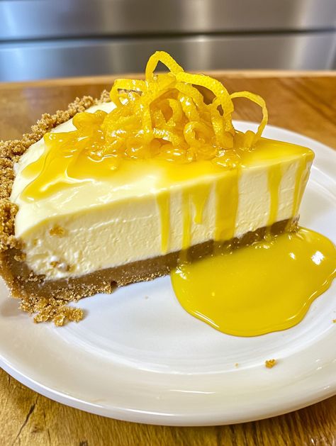 Lemon Cheesecake 🍋  🍋 𝗜𝗻𝗴𝗿𝗲𝗱𝗶𝗲𝗻𝘁𝘀 🍋 Graham Cracker Crust: 2 ⅔ cups graham crackers, crushed into crumbs 🍪 ⅓ cup organic sugar 🍬 ⅔ cup butter, melted 🧈 Lemon Cheesecake Filling: 24 oz cream cheese, softened 🧀 1 ¼ cup organic sugar 🍭 3 cage-free eggs 🥚 2 tablespoons grated lemon peel 🍋 3 tablespoons freshly squeezed lemon juice 🍋 1 teaspoon vanilla extract 🍦 Lemon Glaze: 1 cup organic sugar 2 cage-free eggs ¼ cup freshly squeezed lemon juice 3 tablespoons grated lemon peel Lemon Cheesecake Filling, Cheesecake Ingredients, Cage Free Eggs, Squeezed Lemon, Lemon Glaze, Cheesecake Filling, Cracker Crust, Elegant Desserts, Lemon Cheesecake