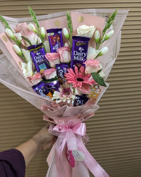 Chocolates n fresh flowers bouquet 💕 Chocolate Flowers Bouquet, Candy Stand, Dairy Milk Chocolate, Fresh Flower Bouquets, Chocolate Flowers, Chocolate Nuts, Gift Bouquet, Chocolate Bouquet, Dairy Milk