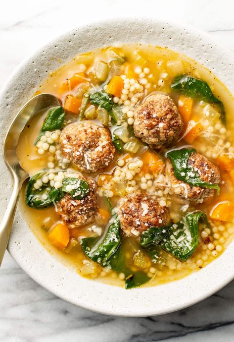 This Italian wedding soup recipe is a classic with homemade meatballs, pasta, and a delicious broth! It's straightforward to make and so comforting. Soup With Meatballs, Salt And Lavender, Italian Wedding Soup Recipe, Tender Meatballs, Wedding Soup, Meatball Soup, Meatball Ingredients, White Bowl, Homemade Italian