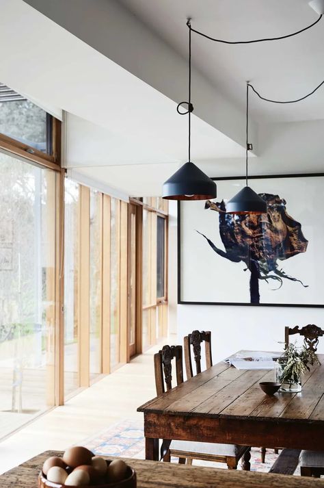 An Australian farmhouse with modern timber extension Timber Extension, Australian Farmhouse, Dog Window, Porthole Window, Lunch Table, Timber Veneer, Warm Decor, Island Bench, Grey Flooring