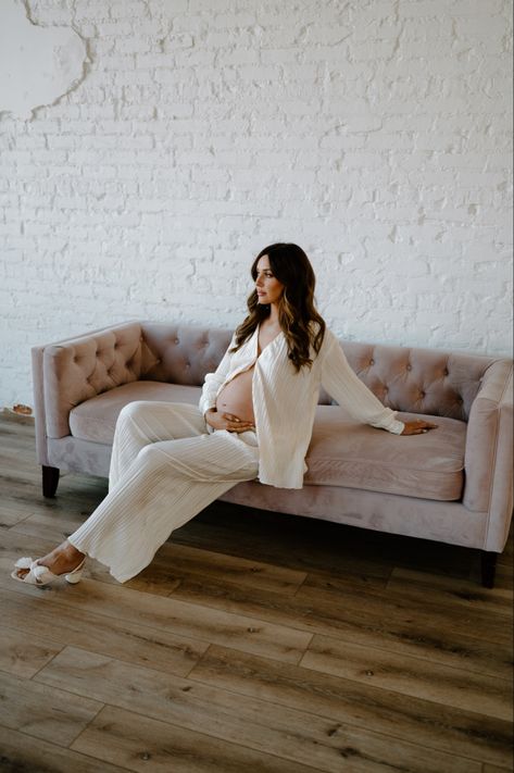 Sofa Maternity Shoot, Maternity Poses On Couch, Maternity Pajama Photoshoot, Lounge Wear Maternity Shoot, Maternity Shoot On Couch, Maternity Pictures On Couch, Jeans And White Button Up Maternity Shoot, Winter Maternity Photoshoot Indoor, Maternity Photography Couch