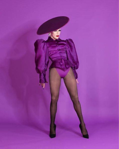 I love this royal purple color so much! the fashion aesthetics in the picture and the hat!  the shoulder pads! just everything! no need for pants. Sasha Velour, Drag Queen Costumes, Purple Pride, Royal Purple Color, Drag Queen Makeup, Queen Makeup, Happy Pride, Happy Birthday To Us, Fashion Aesthetics