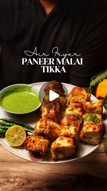 Nehal karkera on Instagram: "Air Fryer Tandoori Series - Ep3: Paneer Malai Tikka! ✨  This restaurant-style recipe guarantees a taste explosion.  Want the detailed video? Comment ‘Malai Tikka,’ and I’ll send you the YouTube link!  Paneer Malai Tikka Ingredients: - 500 gm paneer - 1/2 cup dahi or hung curd - 2 tbsp fresh cream - 1/4 cup grated cheese - 2 tbsp cashew paste - 1 tbsp crushed green chillies - 1 1/2 tbsp ginger garlic paste - 2 tsp crushed black pepper - 1/4 tsp cardamom powder - 1 tsp black salt - 1 tsp chaat masala - 2 tbsp roasted besan/chickpea flour - 2 tsp crushed Kasuri methi - 3-4 tbsp mustard oil - 2 small onion petals - 1 capsicum, large diced - Melted butter for brushing  Method: 1. Soak paneer in lukewarm water with salt for 3-5 mins. 2. Mix all marination ingredients Malai Paneer Tikka, Malai Tikka, Onion Petals, Kasuri Methi, Tandoori Paneer, Restaurant Style Recipes, Tikka Recipe, Ginger Garlic Paste, Paneer Tikka