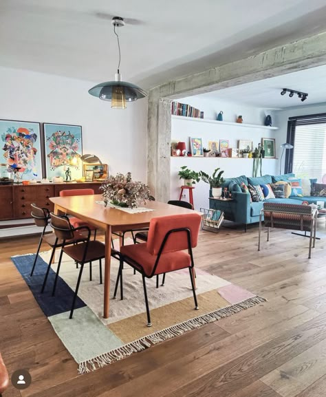 Dining Table Next To Fireplace, Living Dining Area Design, Open Floor Plan With Different Color Walls, Dining Table In Front Of Sliding Door, Dining Room Hang Out Area, Multiple Tables In Dining Room, Funky Retro Dining Room, Colorful Dining Room Rug, Pendant Above Dining Table