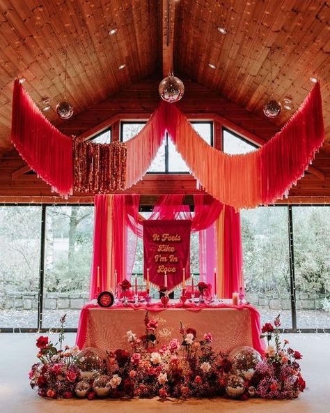 Pink And Orange Wedding Ceremony, Bold Wedding Decor, Pink And Orange Backdrop, Red Pink Orange Wedding, Disco Boho Wedding, Pink And Orange Wedding, Coachella Theme, Orange Wedding Decorations, Gothic Wedding Theme