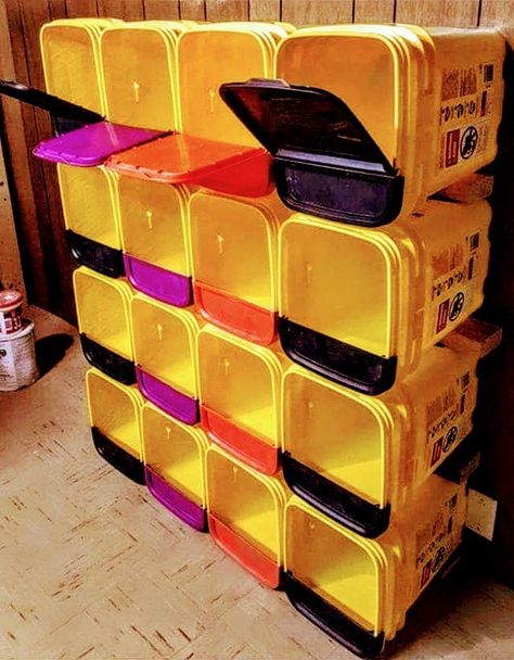 A storage system made of cat litter buckets. Reuse Cat Litter Bucket, Tidy Cats Container Ideas, Tidy Cat Bucket Ideas, Recycled Organizers, Repurposed Cat Litter Bucket, Diy Cubbies, Diy Food Storage, Tidy Cat Litter, Diy Furniture Repair