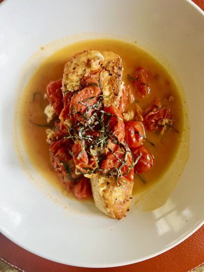 Pesce all’Acqua Pazza (Fish With White Wine and Cherry Tomatoes) | Sara Moulton Sara Moulton, Poached Fish, Cherry Tomato Sauce, Fish Dinner Recipes, Yummy Seafood, Magazine Editor, Fish Recipes Healthy, Mediterranean Food, How To Cook Fish