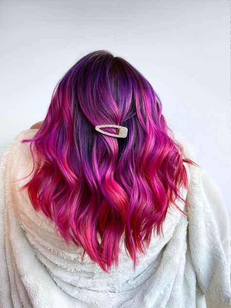 Chromatic Charm: Elegant Hairstyle Ideas That Celebrate Color Sun Set Hair Color, Purple Sunset Hair, Red Pink And Purple Hair, Pink Purple Red Hair, Purple To Red Ombre Hair, Red Pink Ombre Hair, Elumen Hair Color Ideas, Valentines Day Hair Color, Valentines Hair Color