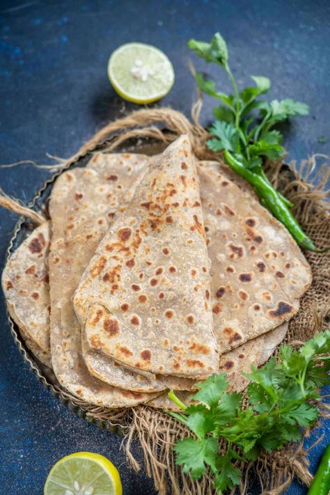 Ajwain Paratha is an unleavened Indian flatbread prepared with whole wheat flour, carom seeds (ajwain), salt and ghee. It is best served for breakfast with tea or coffee (vegetarian, and can be easily made vegan. 1200 Calories A Day, Carom Seeds, Indian Flatbread, Paratha Recipes, 1200 Calories, Sous Chef, Middle Eastern Recipes, Tea Or Coffee, Whole Wheat Flour