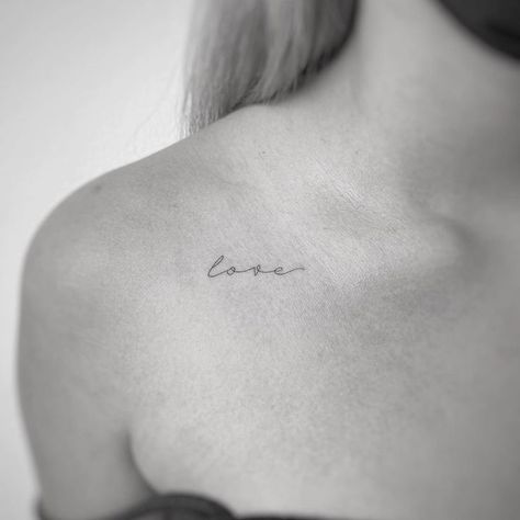 Small Tattoo Idea Minimal Collar Bone Tattoos For Women, Collarbone Tattoos For Women Writing, Love Tattoos For Women Words, Minimalist Tattoo Love Yourself, Love Word Tattoos For Women, Dainty Clavicle Tattoos, Collarbone Tattoo Script, Babe Tattoo Word, Lover Word Tattoo