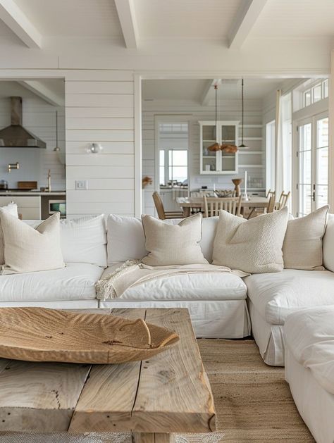 Upscale Beach Decor Interior Design, Vaulted Ceiling Beach House, Beach House Family Room Ideas, Beach House With Dark Wood Furniture, Miami Beach Decor Interior Design, Beach House Lounge Room, Beach Lodge Decor, Neutral Beach Aesthetic Home, Restoration Hardware Beach House