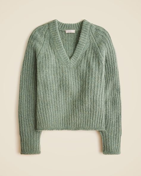 Best in sweaters since 1983.  Crafted from a subtly fuzzy wool-blend yarn that's superwarm, it has an allover ribbed texture, a superlayer-able V-neck and rolled trims at the cuffs and hem. Best Sweaters, Suit Guide, J Crew Sweater, Jcrew Sweater, Women's Sweaters, Thanksgiving Outfit, Sweater Sale, Cool Sweaters, V Neck Sweater