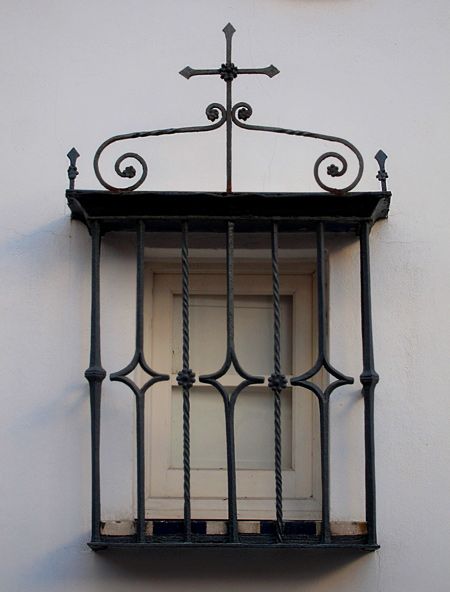 George Washington Smith wrought iron window grilles on Spanish homes inspired by the streets of Spain photos and images Wrought Iron Window, Iron Window Grill, Spanish Colonial Homes, Spanish Style Architecture, California Architecture, Iron Windows, Iron Balcony, Revival Architecture, Window Grill