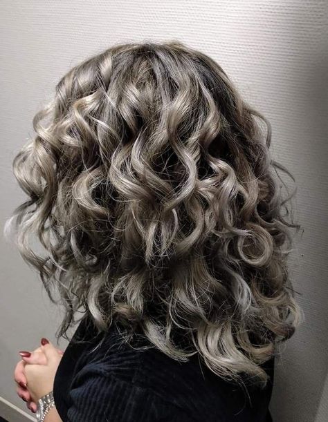 Butterfly Haircuts Every Girl Needs to Try Ash Blonde Curly Hair Natural, Curly Ash Hair, Curly Hair With Grey Highlights, Ash Blonde Wavy Hair, Icy Blonde Highlights Curly Hair, Curly Hair Silver Highlights, Ash Brown Balayage Curly Hair, Ash Blonde Balayage Curly Hair, Ash Blonde Hair Curly