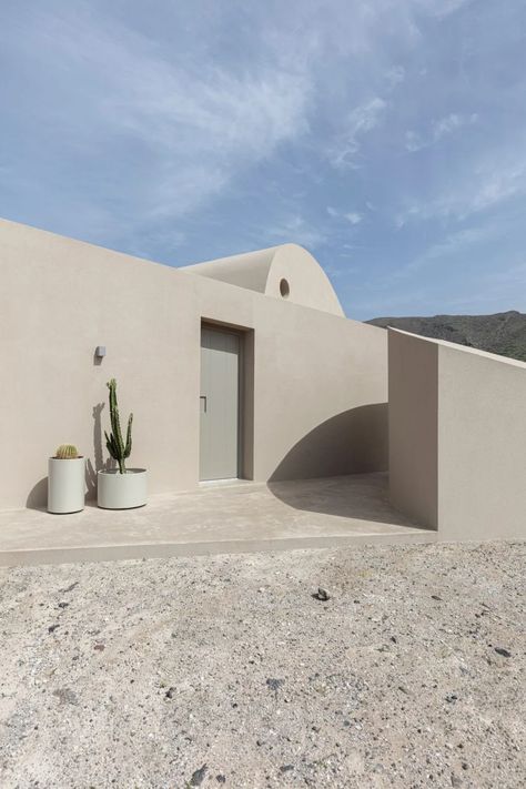 Kapsimalis Architects designs monolithic holiday home in Santorini Santorini Architecture, Greece Architecture, Santorini House, Mediterranean Plants, Santorini Island, Steel Columns, Patio Shade, Volcanic Rock, Elements Of Nature