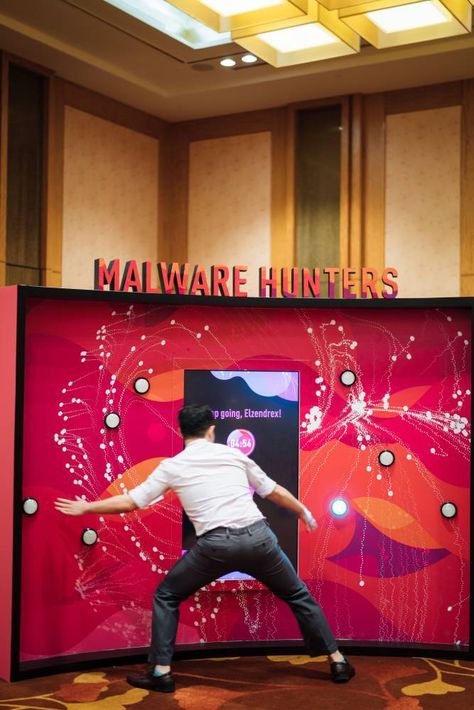 TRINAX | Malware Hunters Bishi Bashi Arcade Game Interactive Booth Games, Interactive Booth Design, Game Booth Design, Interactive Event Ideas, Activation Games, Games For Events, Interactive Booth, Booth Games, Booth Activation