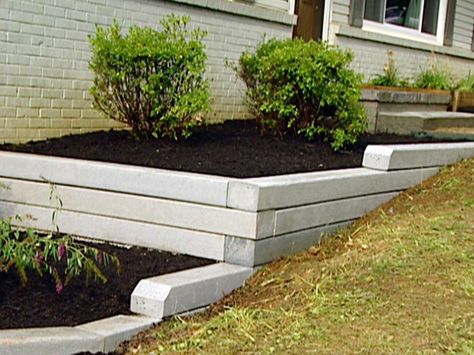 How to Install a Timber Retaining Wall | HGTV Landscape Timber Edging, Timber Retaining Wall, Wood Retaining Wall, Diy Retaining Wall, Retaining Wall Design, Building A Retaining Wall, Decorative Fence, Garden Retaining Wall, Landscape Timbers