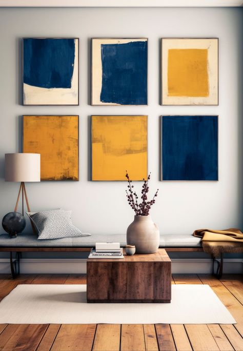 Infuse your space with earthy vibes by crafting a stunning gallery wall featuring framed prints in the warm tones of mustard yellow and the serene hues of indigo blue. Choose frames in rich walnut wood to enhance the natural aesthetic. Let these interior details create a harmonious ambiance that evokes a sense of warmth and tranquility. Embrace the beauty of this earthy color palette and transform your space into a captivating sanctuary. Blue Wood Color Palette, Walnut Color Palette, Blue Cottage Bedroom, Blue And Yellow Interior, Blue Yellow Interior, Mustard Yellow Color Palette, Indigo Color Palette, Mustard Color Palette, Blue And Yellow Aesthetic