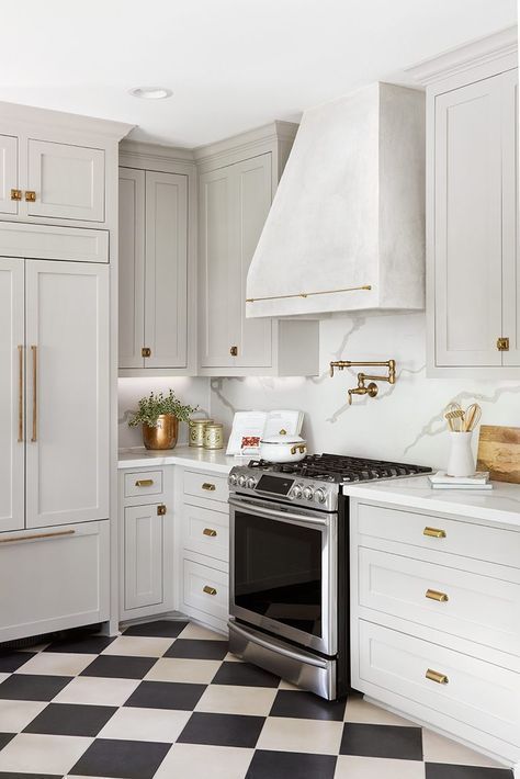 black and white kitchen // gold brass hardware // white cabinets // black nd white tile floor Apartment 2023, Cozy Eclectic, Kitchen 2024, White Kitchen Tiles, 1920s House, White Tile Floor, House Updates, Tudor Style Homes, Diy Kitchen Renovation